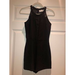 Black romper with mesh accents!